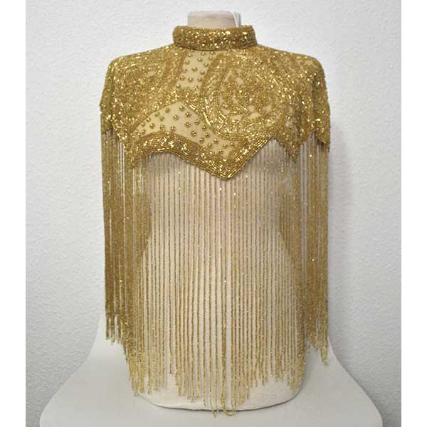 Capa de fiesta joya dorada