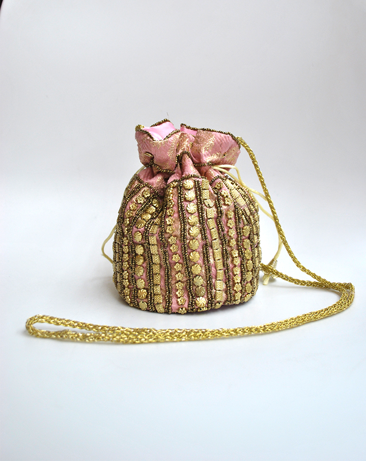 Bombonera clutch rosa